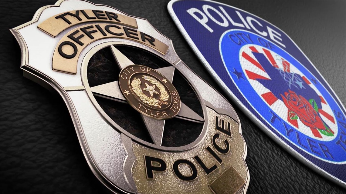 Close up photo of the Tyler Police Department's badge and patch